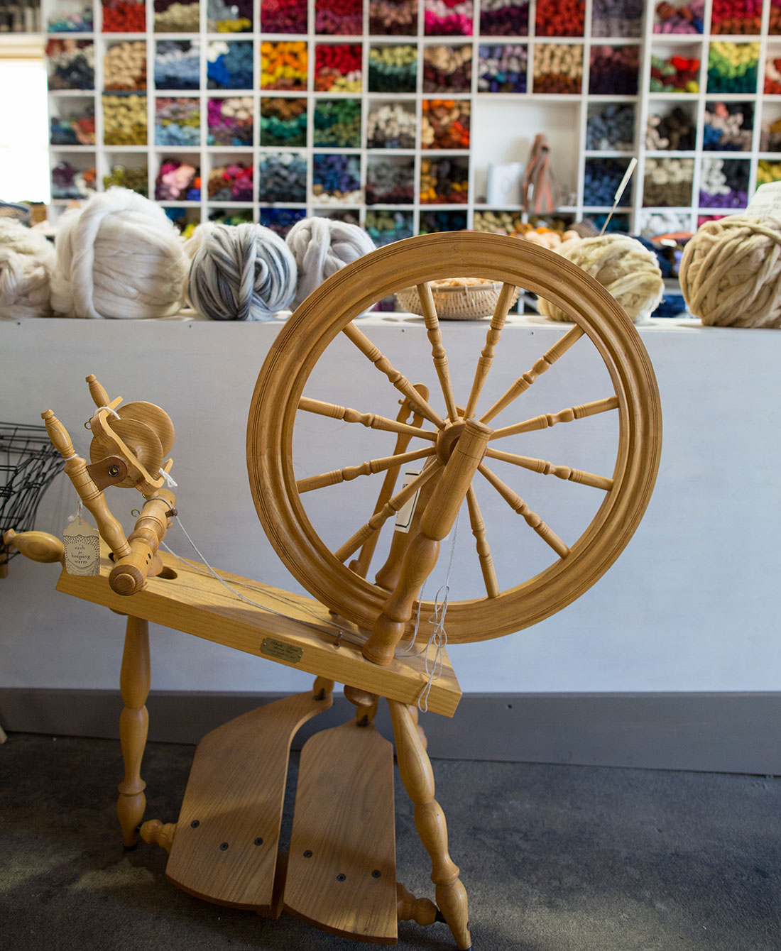 spinning wheel at A Verb for Keeping Warm, photo by Paige Green