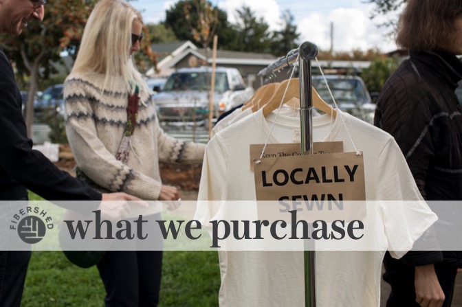 what we purchase: shoppers browsing locally sewn t-shirts